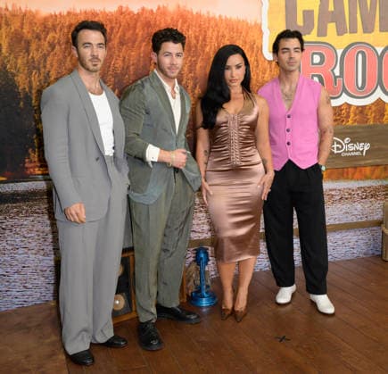 BURBANK, USA, August 10, 2026: Kevin Jonas, Nick Jonas, Demi Lovato, and Joe Jonas at the world premiere of Disney s *Camp Rock 3* at the Walt Disney Studio Lot. Photo by Paul Smith, Featureflash 458817, August 10, 2026, Burbank, CA  Copyright: xPaulxSmithx xFeaturesxFlashx xStarfacex STAR_458817_022