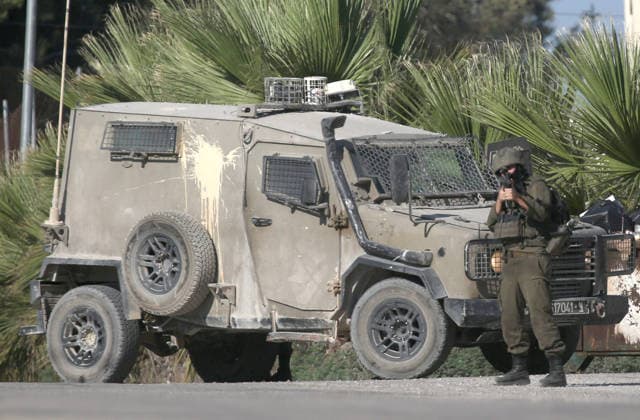 Israeli army demolishes a Palestinian home in Nablus, Palestine - 11 Aug 2026 An Israeli soldier seen aiming his weapon and takes up position towards Palestinians during the demolition. Israeli army demolished the home of a Palestinian accused of carrying out an armed attack that killed an Israeli soldier and a Jewish settler in the village of Tell. Nablus Palestine Copyright: xNasserxishatyehx xSOPAxImagesx Nishtayeh32