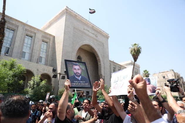 Death sentences for Bashar al-Assad and senior figures in Syria welcomed with celebrations DAMASCUS, SYRIA - AUGUST 11: Syrians gather around the Palace of Justice to celebrate a court s death sentences against ousted leader Bashar al-Assad, his brother Maher al-Assad and his cousin Atef Najib, carrying photographs of people killed by the Assad regime, in the capital Damascus, Syria, on August 11, 2026. Izz Aldien Alqasem Anadolu Damascus Syria. Editorial use only. Please get in touch for any other usage.  Copyright: x2026xAnadoluxIzzxAldienxAlqasemx