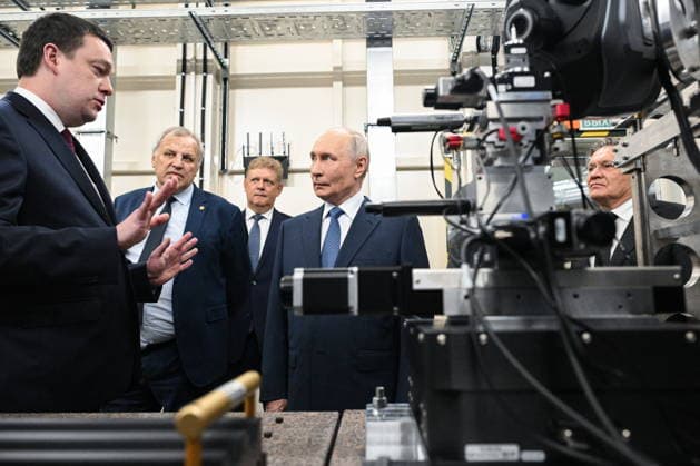 RUSSIA, NOVOSIBIRSK - AUGUST 11, 2026: Russia s President Vladimir Putin (C) visits Shared Research Facility of the Siberian Ring Source of Photons (SKIF). Pictured 2nd L: Valery Bukhtiyarov, Director of Boreskov Institute of Catalysis of the Siberian Branch of the Russian Academy of Sciences; pictured R: Alexei Likhachev, Director General of the Rosatom State Atomic Energy Corporation. Kristina Solovyova TASS  96020228
