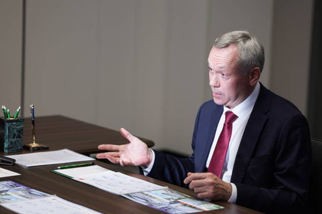 RUSSIA, NOVOSIBIRSK - AUGUST 11, 2026: Novosibirsk Region Governor Andrei Travnikov is seen during a meeting with Russia s President Vladimir Putin. Gavriil Grigorov Russian Presidential Press and Information Office TASS  96027796