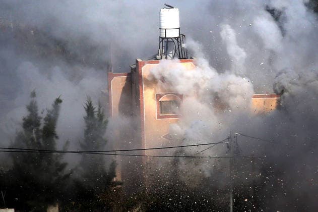 August 11, 2026, Nablus, West Bank, Palestine: Smoke rises from a Palestinian home after it was demolished by the Israeli army with explosives. Israeli army demolished the home of a Palestinian accused of carrying out an armed attack that killed an Israeli soldier and a Jewish settler in the village of Tell. Nablus Palestine  - ZUMAs197 20260811_aaa_s197_010 Copyright: xNasserxishatyehx