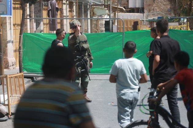 Israeli Forces Restrict Palestinian Movement in Hebron Old City Israeli soldiers deploy in the streets of the Old City of Hebron, in the occupied West Bank, on August 11, 2026, as Israeli forces close several entrances and roads and restrict the movement of Palestinians. The measures coincide with Israeli settlers entering the Old City. Photo by Mamoun Wazwaz apaimages Hebron West Bank Palestinian Territory 110826_Hebron_MW_00(34) Copyright: xapaimagesxMamounxWazwazx xapaimagesx
