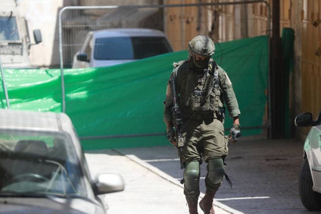 Israeli Forces Restrict Palestinian Movement in Hebron Old City Israeli soldiers deploy in the streets of the Old City of Hebron, in the occupied West Bank, on August 11, 2026, as Israeli forces close several entrances and roads and restrict the movement of Palestinians. The measures coincide with Israeli settlers entering the Old City. Photo by Mamoun Wazwaz apaimages Hebron West Bank Palestinian Territory 110826_Hebron_MW_00(36) Copyright: xapaimagesxMamounxWazwazx xapaimagesx