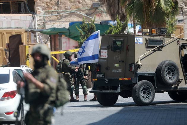 Israeli Forces Restrict Palestinian Movement in Hebron Old City Israeli soldiers deploy in the streets of the Old City of Hebron, in the occupied West Bank, on August 11, 2026, as Israeli forces close several entrances and roads and restrict the movement of Palestinians. The measures coincide with Israeli settlers entering the Old City. Photo by Mamoun Wazwaz apaimages Hebron West Bank Palestinian Territory 110826_Hebron_MW_00(42) Copyright: xapaimagesxMamounxWazwazx xapaimagesx