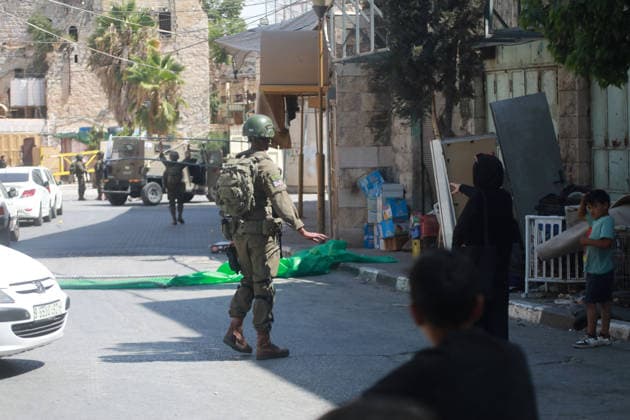 Israeli Forces Restrict Palestinian Movement in Hebron Old City Israeli soldiers deploy in the streets of the Old City of Hebron, in the occupied West Bank, on August 11, 2026, as Israeli forces close several entrances and roads and restrict the movement of Palestinians. The measures coincide with Israeli settlers entering the Old City. Photo by Mamoun Wazwaz apaimages Hebron West Bank Palestinian Territory 110826_Hebron_MW_00(43) Copyright: xapaimagesxMamounxWazwazx xapaimagesx