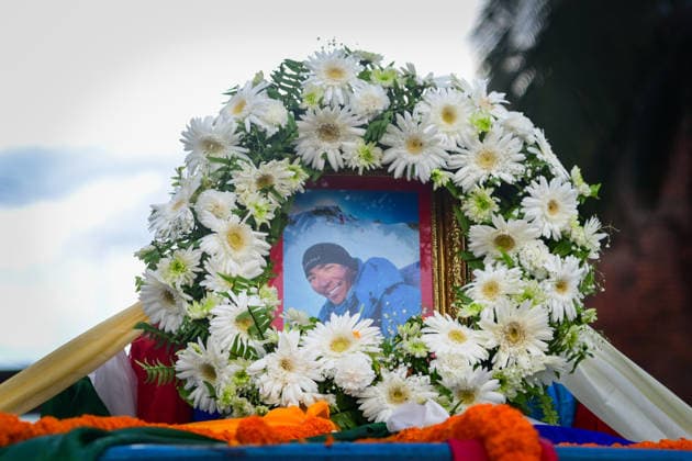 August 11, 2026, Kathmandu, Bagmati, Nepal: A photograph of Nepali mountaineer Kilu Pemba Sherpa is displayed with a garland as the remains of the three climbers are brought to Tribhuvan International Airport in Kathmandu, Nepal, on August 11, 2026, after being repatriated from Pakistan following the Broad Peak avalanche tragedy. Kilu Pemba Sherpa was among 10 members of an international expedition killed in an avalanche while ascending toward Camp 3 on Broad Peak (8,047 m) in PakistanÃ¢â‚¬â ¢s Karakoram Range. The tragedy also claimed the lives of renowned British-Nepali mountaineer Nirmal Ã¢â‚¬oeNimsÃ¢â‚¬Â Purja, Pur Bahadur Gurung (Yukta), Nima Sherpa, Nawang Thindu Sherpa, Gyalu Sherpa, Wang Zhong of China, Nadhira Ahmed Abdullah Al Ha  - ZUMAs330 20260811_zsp_s330_017 Copyright: xSafalxPrakashxShresthax
