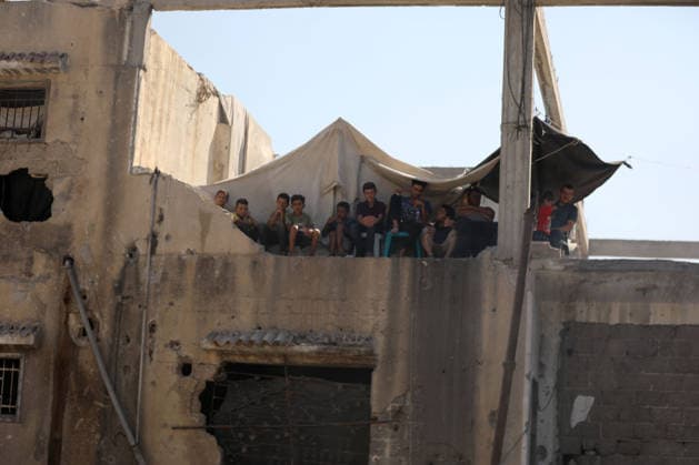 Civil Defense Teams Recover Bodies From Gaza City Rubble Palestinian Civil Defense members, in cooperation with the International Committee of the Red Cross (ICRC), work with limited resources to recover bodies from beneath the rubble of a home belonging to the Gharbiya family in western Gaza City, Gaza Strip, on August 11, 2026. Medics say 13 bodies remain trapped under the rubble, as search and recovery operations continue amid a severe shortage of heavy equipment needed to clear debris and reach the victims. Photo by Bilal Osama apaimages Gaza city Gaza Strip Palestinian Territory 110826_Gaza_BO_01(19) Copyright: xapaimagesxBilalxOsamax xapaimagesx