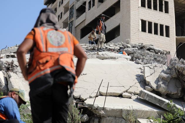 Civil Defense Teams Recover Bodies From Gaza City Rubble Palestinian Civil Defense members, in cooperation with the International Committee of the Red Cross (ICRC), work with limited resources to recover bodies from beneath the rubble of a home belonging to the Gharbiya family in western Gaza City, Gaza Strip, on August 11, 2026. Medics say 13 bodies remain trapped under the rubble, as search and recovery operations continue amid a severe shortage of heavy equipment needed to clear debris and reach the victims. Photo by Bilal Osama apaimages Gaza city Gaza Strip Palestinian Territory 110826_Gaza_BO_01(6) Copyright: xapaimagesxBilalxOsamax xapaimagesx