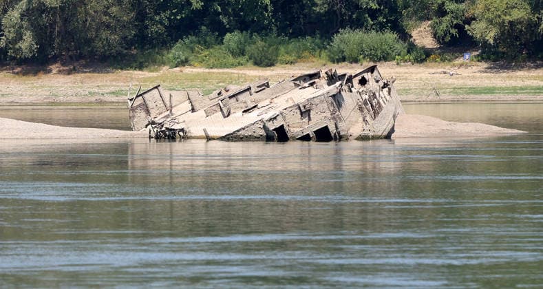 World War II-German warships emerge from Danube amid low water levels in Serbia PRAHOVO, SERBIA - AUGUST 11: Sunken hulls of World War II-era Nazi warships lie exposed in the Danube River near Prahovo, Serbia on August 11, 2026. Extreme heat and severe drought across Europe have caused water levels in the river to drop to historic lows, revealing dozens of scuttled German vessels laden with explosives from 1944. According to some estimates, around 200 World War II shipwrecks lie on the sandy bed of the Danube. Sasa Djordjevic Anadolu Prahovo Serbia. Editorial use only. Please get in touch for any other usage.  Copyright: x2026xAnadoluxSasaxDjordjevicx