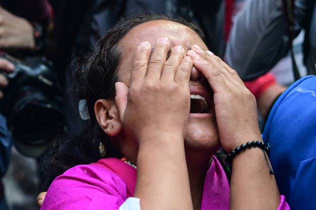 August 11, 2026, Kathmandu, Bagmati, Nepal: A relative of one of the Nepali mountaineers mourns as the remains of Kilu Pemba Sherpa (Kilu), Nima Sherpa, and Gyalu Sherpa are brought to Tribhuvan International Airport in Kathmandu, Nepal, on August 11, 2026, after being repatriated from Pakistan following the Broad Peak avalanche tragedy. The three climbers were among 10 members of an international expedition killed in an avalanche while ascending toward Camp 3 on Broad Peak (8,047 m) in PakistanÃ¢â‚¬â ¢s Karakoram Range. The tragedy also claimed the lives of renowned British-Nepali mountaineer Nirmal(Nims)Purja, Pur Bahadur Gurung (Yukta), Nawang Thindu Sherpa, Wang Zhong of China, Nadhira Ahmed Abdullah Al Harthy of Oman, Sarah Mallory Gei  - ZUMAs330 20260811_zsp_s330_019 Copyright: xSafalxPrakashxShresthax