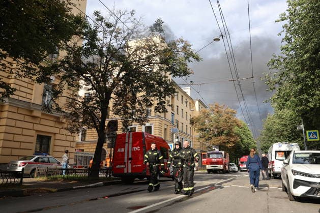 RUSSIA, ST PETERSBURG - AUGUST 11, 2026: Emergency units respond to a roof fire at the Vyborgsky Palace of Culture. Valentin Yegorshin TASS  96035739