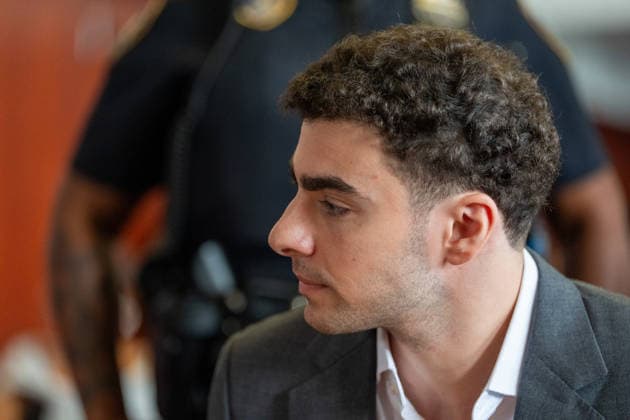 Luigi Mangione, accused of killing Brian Thompson, the CEO of UnitedHealthcare, attends a pre-trial appearance at Manhattan Criminal Court, in New York City, on Tuesday, August 11, 2026. Pool  NYX20260811201 DAVIDxDEExDELGADO