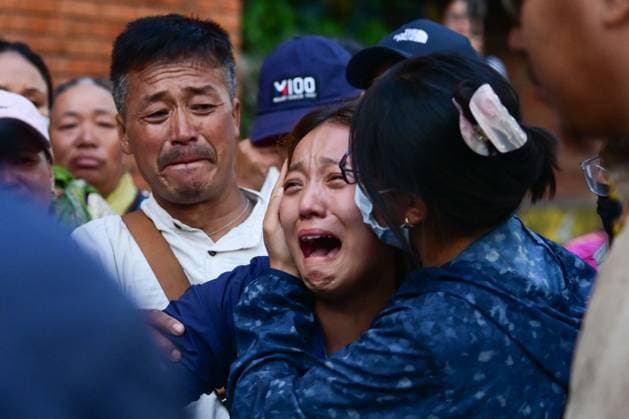 August 11, 2026, Kathmandu, Nepal: KATHMANDU, NEPAL Ã¢â‚¬ AUGUST 11, 2026: Relatives mourn at Tribhuvan International Airport as the remains of Nepali mountaineers Kilu Pemba Sherpa, Nima Sherpa and Gyalu Sherpa arrive in Kathmandu after being repatriated from Pakistan following the Broad Peak avalanche tragedy. The three climbers were among 10 members of an international expedition killed by an avalanche while ascending toward Camp 3 on Broad Peak, an 8,047-meter mountain in Pakistan s Karakoram Range. The tragedy also claimed the lives of renowned British-Nepali mountaineer Nirmal Nims Purja and climbers from China, Oman, the United States and Pakistan. Kathmandu Nepal  - ZUMAq101 20260811_zna_q101_101 Copyright: xSafalxPrakashxShresthax