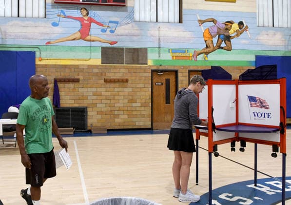 August 11, 2026, Racine, Wisconsin, USA: ANDREW FENDERSON and LYNN LEVIN vote at the Tyler Domer Community Center in Racine in the Wisconsin primary election Tuesday August 11, 2026. National focus is on the Democratic gubernatorial primary and on efforts to flip several Republican congressional seats, including that of incumbent Bryan Steil who represents the First Congressional District, including Racine County. Racine USA  - ZUMAh154 20260811_znp_h154_005 Copyright: xMarkxHertzbergx