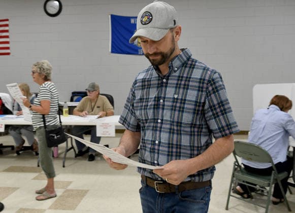 August 11, 2026, Raymond, Wisconsin, USA: MITCHELL BERMAN votes Tuesday August 11, 2026 at the Village of Raymond Town Hall in his three-way Democratic primary race hoping to unseat Republican incumbent Bryan Steil who represents the First Congressional District, including Racine County. Raymond USA - ZUMAh154 20260811_znp_h154_023 Copyright: xMarkxHertzbergx