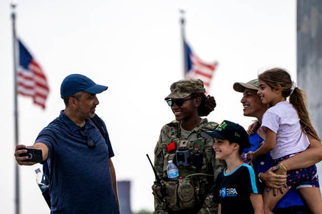 Members of the National Guard patrol near the Washington Monument in Washington, DC on Tuesday, August 11, 2026. Today marks the one year anniversary the National Guard troops, more than 4,600 at present, have patrolled the streets of Washington, DC, after President Donald Trump deployed them in August 2025.  WAP2026081126354 BONNIExCASH