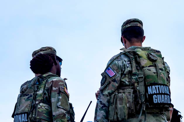 Members of the National Guard patrol near the Washington Monument in Washington, DC on Tuesday, August 11, 2026. Today marks the one year anniversary the National Guard troops, more than 4,600 at present, have patrolled the streets of Washington, DC, after President Donald Trump deployed them in August 2025.  WAP2026081126362 BONNIExCASH