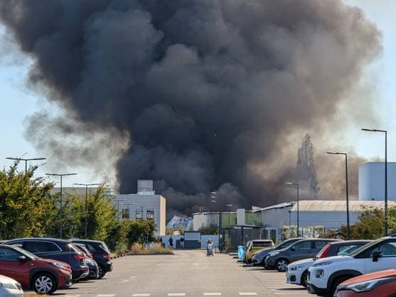Major fire broke near Roissy-CDG Airport in Paris PARIS, FRANCE - AUGUST 11: A view of smoke after a fire broke in Louvres, near Roissy-CDG Airport, north of Paris, France on August 11, 2026. The fire led to the temporary closure of two of the airport’s runways. Rail and road traffic was partially disrupted. In total, nearly 110 firefighters were deployed and, according to initial reports, at least several dozen vehicles were destroyed by the flames. Luc Auffret Anadolu Paris France. Editorial use only. Please get in touch for any other usage.  Copyright: x2026xAnadoluxLucxAuffretx