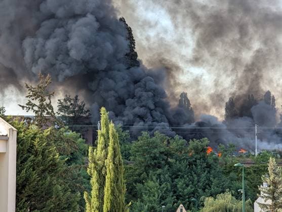 Major fire broke near Roissy-CDG Airport in Paris PARIS, FRANCE - AUGUST 11: A view of smoke after a fire broke in Louvres, near Roissy-CDG Airport, north of Paris, France on August 11, 2026. The fire led to the temporary closure of two of the airport’s runways. Rail and road traffic was partially disrupted. In total, nearly 110 firefighters were deployed and, according to initial reports, at least several dozen vehicles were destroyed by the flames. Luc Auffret Anadolu Paris France. Editorial use only. Please get in touch for any other usage.  Copyright: x2026xAnadoluxLucxAuffretx