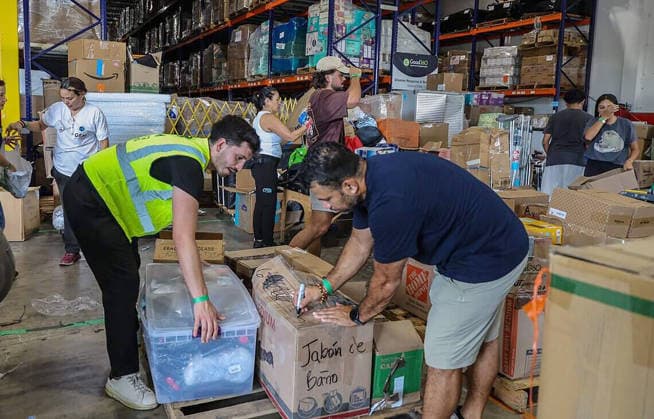 August 11, 2026, Fl, USA: Volunteers filled boxes with supplies of aid for the victims in Colombia, as a press conference held by Michael Capponi, founder of the Global Empowerment Mission (GEM), was taking place to detail the urgent relief operations and a call for local volunteers and the need of donations a day after the devastating 7.4-magnitude earthquake that struck western Colombia on Aug. 10, at the organizationÃ¢â‚¬â ¢s headquarters in Doral, Florida, on Tuesday, Aug. 11, 2026. USA - ZUMAm67_ 20260811_zaf_m67_002 Copyright: xPedroxPortalx