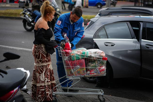 Colombians deliver donations for earthquake victims in Bogota BOGOTA, COLOMBIA – AUGUST 11, 2026: A Colombian Red Cross official receives humanitarian aid from a woman at a collection center in Bogota, Colombia, on August 11, 2026. The donations will be sent to communities affected by the earthquake that struck Colombia on August 10, causing damage and affecting several cities across the country. Andres Acero Anadolu Bogota Colombia. Editorial use only. Please get in touch for any other usage.  Copyright: x2026xAnadoluxAndresxAcerox