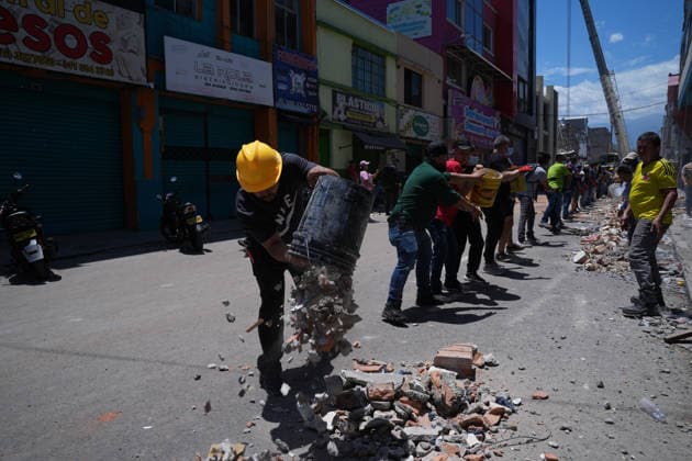 Rescuers search for survivors in Colombia s Pereira after earthquake PEREIRA, COLOMBIA — AUGUST 11: People walk through the streets of Pereira, Colombia, a day after a powerful 7.4-magnitude earthquake struck western Colombia on Monday, August 10. Residents assess the aftermath as emergency crews continue responding to damage caused by the earthquake in Pereira, Colombia on August 11,2026. Juancho Torres Anadolu Pereira Colombia. Editorial use only. Please get in touch for any other usage.  Copyright: x2026xAnadoluxJuanchoxTorresx