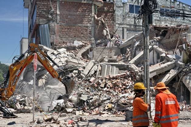(260812) -- CALI, Aug. 12, 2026 -- Rescuers are seen near the ruins of buildings damaged in an earthquake in Cali, Colombia, Aug. 11, 2026. The death toll from Monday s 7.4-magnitude earthquake in western Colombia has risen to 188, with 1,677 others injured, the Colombian Association of Capital Cities, or Asocapitales, said Tuesday. Asocapitales said it has launched a system to report and search for missing persons as rescue and damage assessment work continues. ( Handout via Xinhua) (SpotNews) COLOMBIA-CALI-EARTHQUAKE-SEARCH AND RESCUE COLPRENSA 