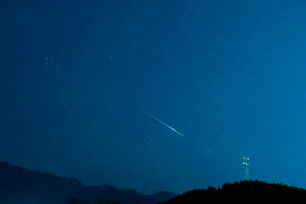 SHAOGUAN, CHINA - AUGUST 12: A shooting star lights up the night sky during the Perseid Meteor Shower on August 12, 2026 in Renhua County, Shaoguan City, Guangdong Province of China.  Copyright: xVCGx 111659491908