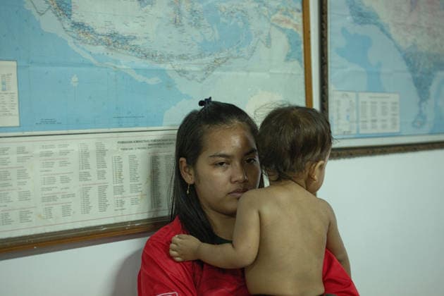 August 12, 2026, Karangasem, Bali, Indonesia: Passengers of the ferry KMP Putri Yasmin await data collection and medical examinations at the ASDP Emergency Post in Padangbai Port, Karangasem, Bali. ...A navy vessel and surrounding ships rushed to rescue 131 people onboard (114 passengers and 17 crew members) after the inter-island ferry caught fire in the Sekotong waters of the Lombok Strait at around 4:15 AM local time during its voyage to Lembar, Lombok. Authorities confirmed 35 survivors were evacuated back to Padangbai, while the remaining were transported to Lombok. One casualty was reported in the incident. Karangasem Indonesia - ZUMAp229 20260812_zip_p229_006 Copyright: xLanaxPriatnax