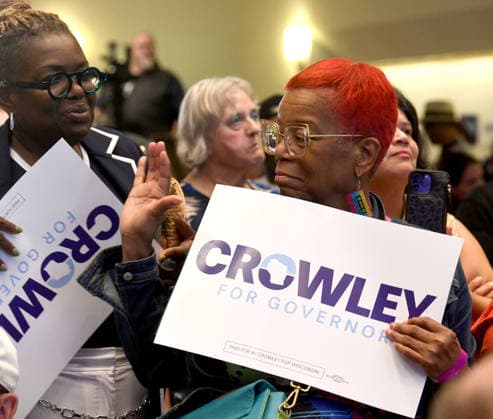 August 11, 2026, Milwaukee, Wisconsin, USA: Supporters of Democratic gubernatorial candidate David Crowley react to television news reports during a watch party Tuesday night August 11, 2026 at the Hyatt Regency hotel in downtown Milwaukee. Crowley had not appeared by Midnight. The race against Francesca Hong was still very close when it was announced that human error caused a delay in counting absentee ballots from Milwaukee. Milwaukee USA - ZUMAh154 20260811_znp_h154_035 Copyright: xMarkxHertzbergx