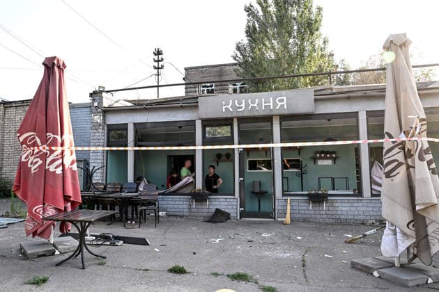RECORD DATE NOT STATED A privately owned food establishment damaged in a massive combined Russian strike on Zaporizhzhia, Ukraine, on August 11, 2026. Overnight on August 11, Russian forces launched a massive combined strike on Zaporizhzhia, firing 10 missiles at the city, including a North Korean ballistic missile and Zircon hypersonic missiles, as well as guided aerial bombs (KABs). The attack completely destroyed the State Center for Standardization, Metrology and Certification and damaged or destroyed a number of industrial facilities and civilian infrastructure sites, including food establishments, four apartment buildings and a garage cooperative, where the blast wave demolished garages and dozens of vehicles. Six people were killed and 52 others were injur  Copyright: xDmytroxSmolienkox