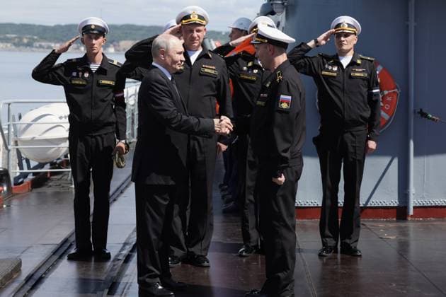 Russia Putin Far Eastern Federal District 9220813 12.08.2026 Russian President Vladimir Putin, accompanied by Guards missile cruiser Varyag commander Captain 1st Rank Konstantin Petrov and commander of the 36th Surface Ship Division of the Pacific Fleet s Primorye Flotilla Alexei Ulyanenko, visits the cruiser during the final stage of the Pacific Fleet s exercises off the coast of Sakhalin region, Russia. Gavriil Grigorov Sputnik Sakhalin Region Russia  Copyright: xGavriilxGrigorovx