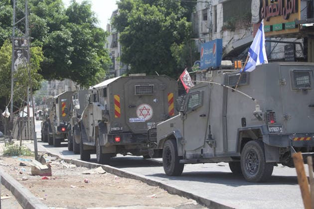Israeli Forces Raid Balata Refugee Camp Near Nablus Israeli forces deploy during a military operation in Balata refugee camp, east of the West Bank city of Nablus, on August 12, 2026. Israeli forces also raid the camp’s central market during the operation. Photo by Mohammed Nasser apaimages Nablus West Bank Palestinian Territory 120826_Nablus_MN_00(16) Copyright: xapaimagesxMohammedxNasserx xapaimagesx
