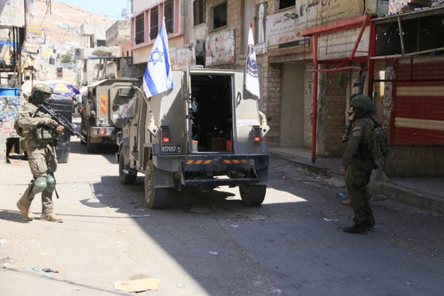 Israeli Forces Raid Balata Refugee Camp Near Nablus Israeli forces deploy during a military operation in Balata refugee camp, east of the West Bank city of Nablus, on August 12, 2026. Israeli forces also raid the camp’s central market during the operation. Photo by Mohammed Nasser apaimages Nablus West Bank Palestinian Territory 120826_Nablus_MN_00(17) Copyright: xapaimagesxMohammedxNasserx xapaimagesx