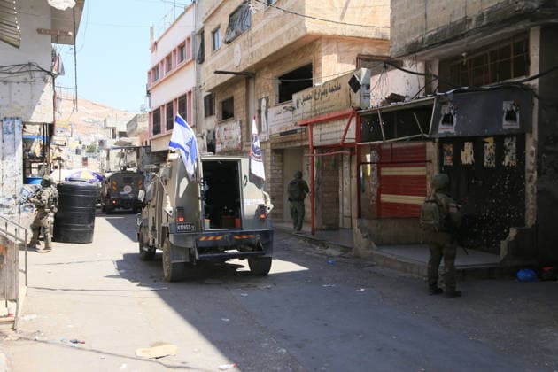 Israeli Forces Raid Balata Refugee Camp Near Nablus Israeli forces deploy during a military operation in Balata refugee camp, east of the West Bank city of Nablus, on August 12, 2026. Israeli forces also raid the camp’s central market during the operation. Photo by Mohammed Nasser apaimages Nablus West Bank Palestinian Territory 120826_Nablus_MN_00(19) Copyright: xapaimagesxMohammedxNasserx xapaimagesx