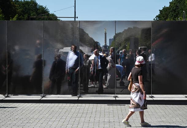65th Anniversary of the Berlin Wall in Berlin BERLIN, GERMANY – AUGUST 12: People visit the opening ceremony of a 30-meter-long temporary memorial installation and the open-air exhibition Views of the Wall: Berlin 1961–1990, marking the 65th anniversary of the construction of the Berlin Wall, near the Brandenburg Gate in Berlin, Germany, on August 12, 2026. Volodymyr Sindieiev Anadolu Berlin Germany. Editorial use only. Please get in touch for any other usage.  Copyright: x2026xAnadoluxVolodymyrxSindieievx