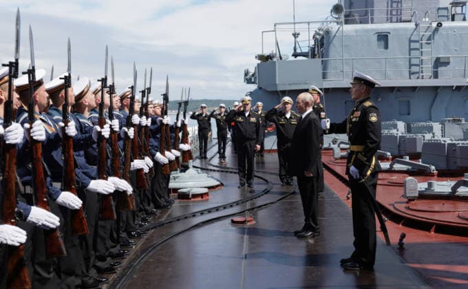 August 12, 2026, Korsakov, Sakhalin Oblast, Russia: Russian President Vladimir Putin, right, reviews the honor guard aboard the Russian Navy Slava-class missile cruiser RF Varyag, August 12, 2026 in Korsakov, Sakhalin Oblast, Russia. Putin is visiting the remote island in the Russian Far East to view the Pacific Fleet naval exercises. Korsakov Russia - ZUMAp138 20260812_zaa_p138_003 Copyright: xGavriilxGrigorov RussianxGovernmx