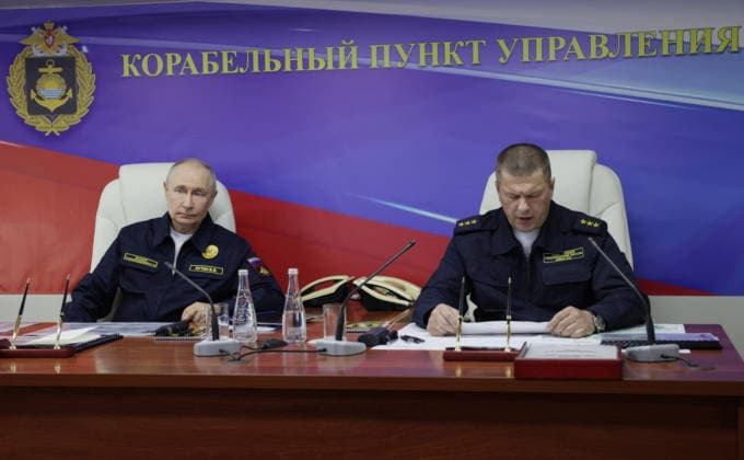 August 12, 2026, Korsakov, Sakhalin Oblast, Russia: Russian President Vladimir Putin, left, listens to Pacific Fleet Commander-in-Chief Admiral Viktor Liina, right, during a briefing aboard the Russian Navy Slava-class missile cruiser RF Varyag, August 12, 2026 in Korsakov, Sakhalin Oblast, Russia. Putin is visiting the remote island in the Russian Far East to view the Pacific Fleet naval exercises. Korsakov Russia - ZUMAp138 20260812_zaa_p138_007 Copyright: xGavriilxGrigorov RussianxGovernmx