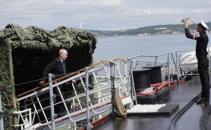 August 12, 2026, Korsakov, Sakhalin Oblast, Russia: Russian President Vladimir Putin, left, is welcomed aboard the Russian Navy Slava-class missile cruiser RF Varyag, the flagship of the Russian Pacific Fleet, August 12, 2026 in Korsakov, Sakhalin Oblast, Russia. Putin is visiting the remote island in the Russian Far East to view the Pacific Fleet naval exercises. Korsakov Russia - ZUMAp138 20260812_zaa_p138_010 Copyright: xGavriilxGrigorov RussianxGovernmx