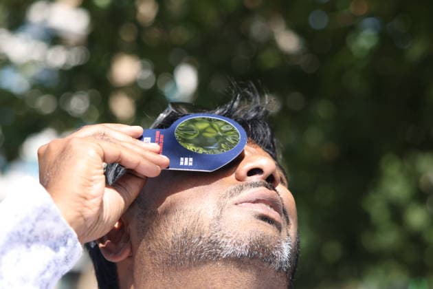 RECORD DATE NOT STATED Total Solar Eclipse In Saragossa, Spain. A person wears special sunglasses while preparing to watch total solar eclipse from Puente de Piedra bridge in Saragossa, Spain on August 12th, 2026. Zaragoza will experiencesl a total 100% sun coverage lasting for about 1 minute and 27 seconds. Zaragoza Spain  Copyright: xBeataxZawrzelx originalFilename: zawrzel-notitle260812_np67H.jpg