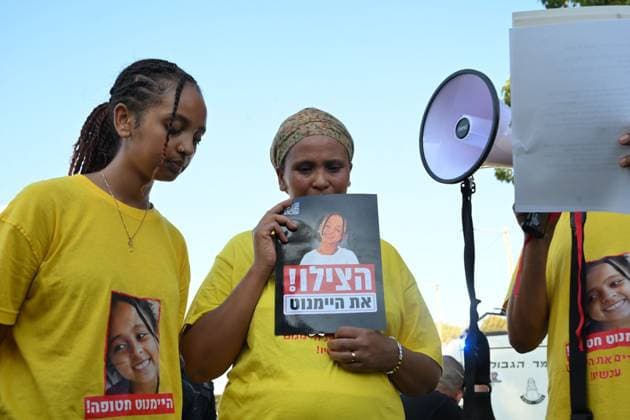 August 12, 2026, Tel Aviv, Israel: TEL AVIV, ISRAEL Ã¢â‚¬ AUGUST 12, 2026: Protesters gather outside the offices of the Israel Security Agency (Shin Bet) to mark 900 days since the abduction of Heymanot Kasau in Tel Aviv, Israel, August 12, 2026. Demonstrators call for answers from the authorities and renewed efforts in the ongoing search for Kasau, whose disappearance remains unresolved. Tel Aviv Israel  - ZUMAq101 20260812_zna_q101_150 Copyright: xPaulinaxPatimerx