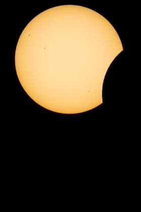 This image shows a partial solar eclipse captured in Hemiksem on %datetext. The moon will cover about 90% of the sun during this solar eclipse. %PHOTOGRAPHER  TomxGoyvaerts 183229020