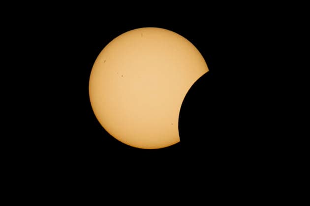 This image shows a partial solar eclipse captured in Hemiksem on %datetext. The moon will cover about 90% of the sun during this solar eclipse. %PHOTOGRAPHER  TomxGoyvaerts 183229091