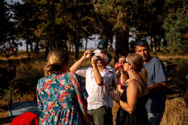 Burgos Observes the 2026 Total Solar Eclipse A group of people during the 2026 total solar eclipse, on August 12, 2026, in Burgos, Castile and León, Spain. This is the first total solar eclipse visible from the Iberian Peninsula in over a century. The path of totality crosses Spain from west to east and passes through numerous provincial capitals, from which observers will be able to catch a glimpse of the first event in the so-called trio of eclipses, since on August 2, 2027, another total eclipse will cross Spain, and on January 26, 2028, an annular eclipse will occur in Spain  Copyright: xGabrielxLuengasx 7711465