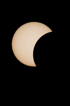 This image shows a partial solar eclipse captured in Hemiksem on %datetext. The moon will cover about 90% of the sun during this solar eclipse. %PHOTOGRAPHER  TomxGoyvaerts 183229698
