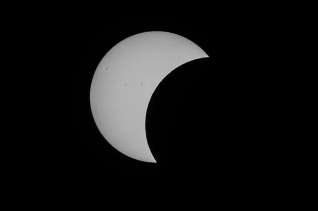 This image shows a partial solar eclipse captured in Hemiksem on %datetext. The moon will cover about 90% of the sun during this solar eclipse. %PHOTOGRAPHER  TomxGoyvaerts 183230227