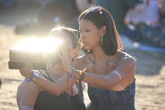 August 12, 2026, London, London, UK: London, UK. People wearing protective glasses watch a solar eclipse in Greenwich as the Moon passes in front of the Sun and blocks its light. In London, more than 90% of the Sun is covered at the peak of the eclipse. The eclipse takes place across the UK from 18:17 to 20:06, reaching its maximum at 19:12. London UK  - ZUMAl94_ 20260812_zaf_l94_036 Copyright: xMarcinxNowakx