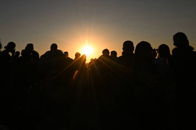 Hundreds Gather At Krakow s Historic Krakus Mound To Watch Solar Eclipse KRAKOW, POLAND - AUGUST 12: Spectators stand in complete silhouette against the bright, low-hanging sun as it begins to undergo a solar eclipse to watch a solar eclipse on August 12, 2026 in Krakow, Poland. Hundreds of onlookers gathered at the summit of the historic Krakus Mound (Kopiec Krakusa) to experience the celestial event during the late afternoon sunset over the city. Krakow Poland  Copyright: xArturxWidakx originalFilename: widak-hundreds260812_np4XR.jpg
