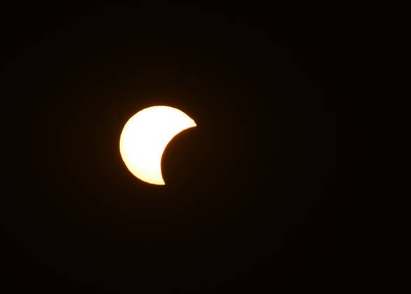 Hundreds Gather At Krakow s Historic Krakus Mound To Watch Solar Eclipse KRAKOW, POLAND - AUGUST 12: A view of the sun partially obscured by the moon during a solar eclipse over Poland, on August 12, 2026 in Krakow, Poland. The rare celestial event drew hundreds of residents and tourists to elevated vantage points like the historic Krakus Mound (Kopiec Krakusa) to witness the late afternoon alignment. Krakow Poland  Copyright: xArturxWidakx originalFilename: widak-hundreds260812_np8qD.jpg